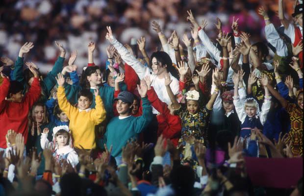 147306 08: Singer Michael Jackson performs at Super Bowl XXVII January 31, 1993 in Pasadena, CA. Jackson began singing professionally at the age of eight, and achieved superstardom sixteen years later with the release of "Thriller," the biggest-selling album of all time. (Photo by Joe Traver/Liaison)